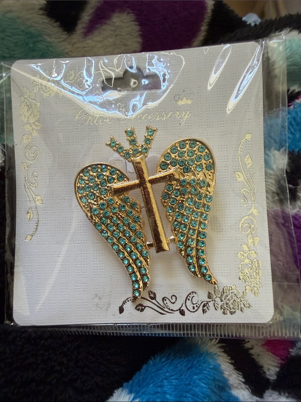 Gold-tone Wing and Cross Brooch with Turquoise Crystals